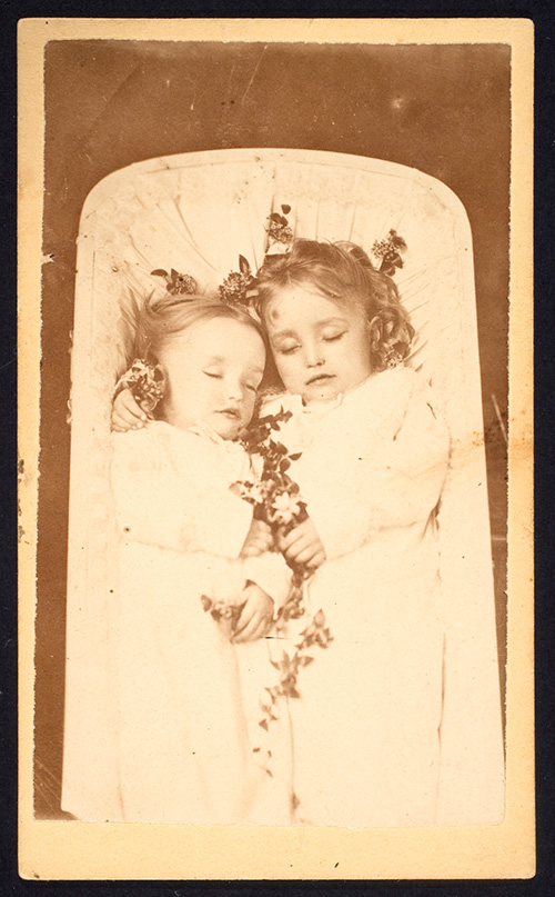 Sisters sharing a casket, ca. 1865